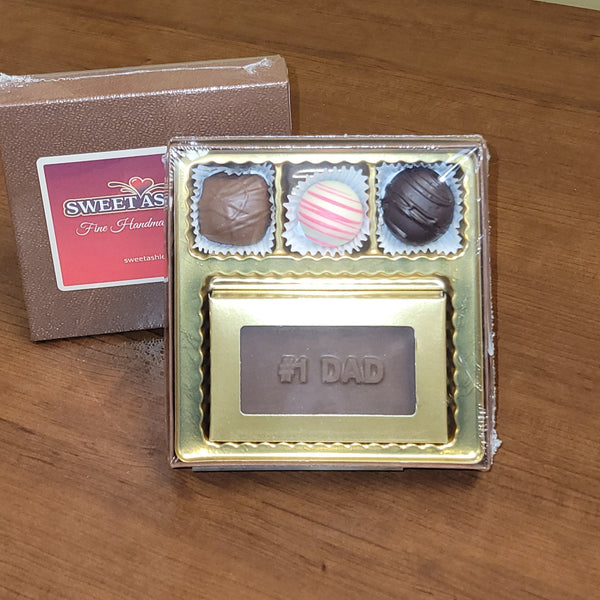 3 chocolates with a # 1 Dad chocolate bar